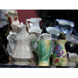 A Collection of Victorian and Later Jugs; examples to include leaf moulded jackfield type, Ringtons,