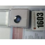 An Oval Cut Tanzanite, unmounted; together with a Global Gems Lab Certificate card stating carat