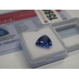 A Trillion Cut Tanzanite, unmounted; together with a Global Gems Lab Certificate card stating