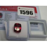 A Cushion Cut Ruby, unmounted; together with a Global Gems Lab Certificate card stating carat weight