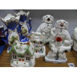 A Pair of XIX Century Staffordshire Spaniels, XIX Century Staffordshire pastile burners, and a