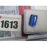 An Emerald Cut Sapphire, unmounted; together with a Global Gems Lab Certificate card stating carat