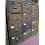 An Early XX Century Pine Chest, of twelve drawers, with brass cup handles.
