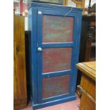 A Painted Cupboard, with a panelled door,on a plinth base.