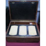 A XIX Century Brown Leather Folding Writing Box, with fitted interior brass handle.