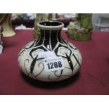 A Moorcroft Pottery Vase, painted in the 'Peacock Parade' (black/white) design by Nicola Slaney,