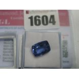 A Cushion Cut Tanzanite, unmounted; together with a Global Gems Lab Certificate card stating carat