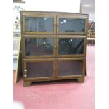 Oak Three Sectional Bookcase in The Globe Wernicke style, with twin glazed doors to each piece, on