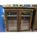 A XIX Century Mahogany Book Cabinet, with twin glazed upper doors, 135cm wide.