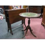 An Early XX Century Mahogany Sutherland Table, together with a mahogany wine table, with a green