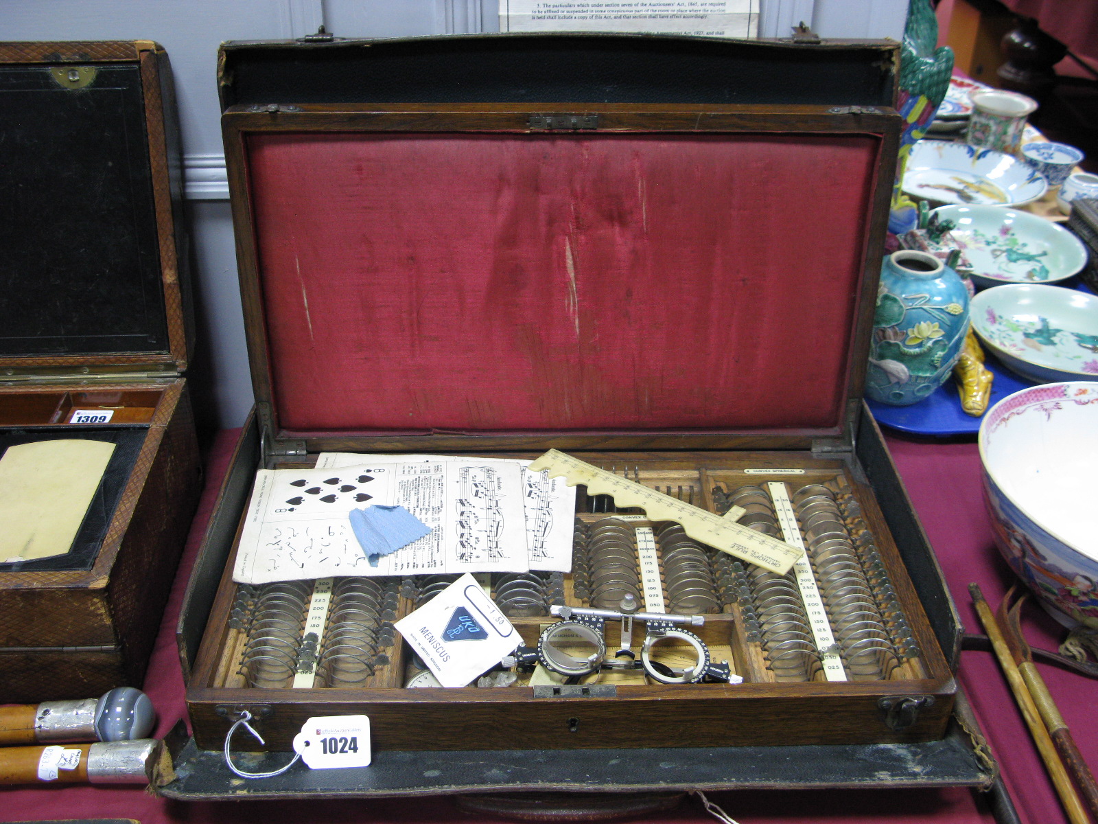 An Early XX Century Oak Optometrists Travelling Case, containing over one hundred and twenty lenses,