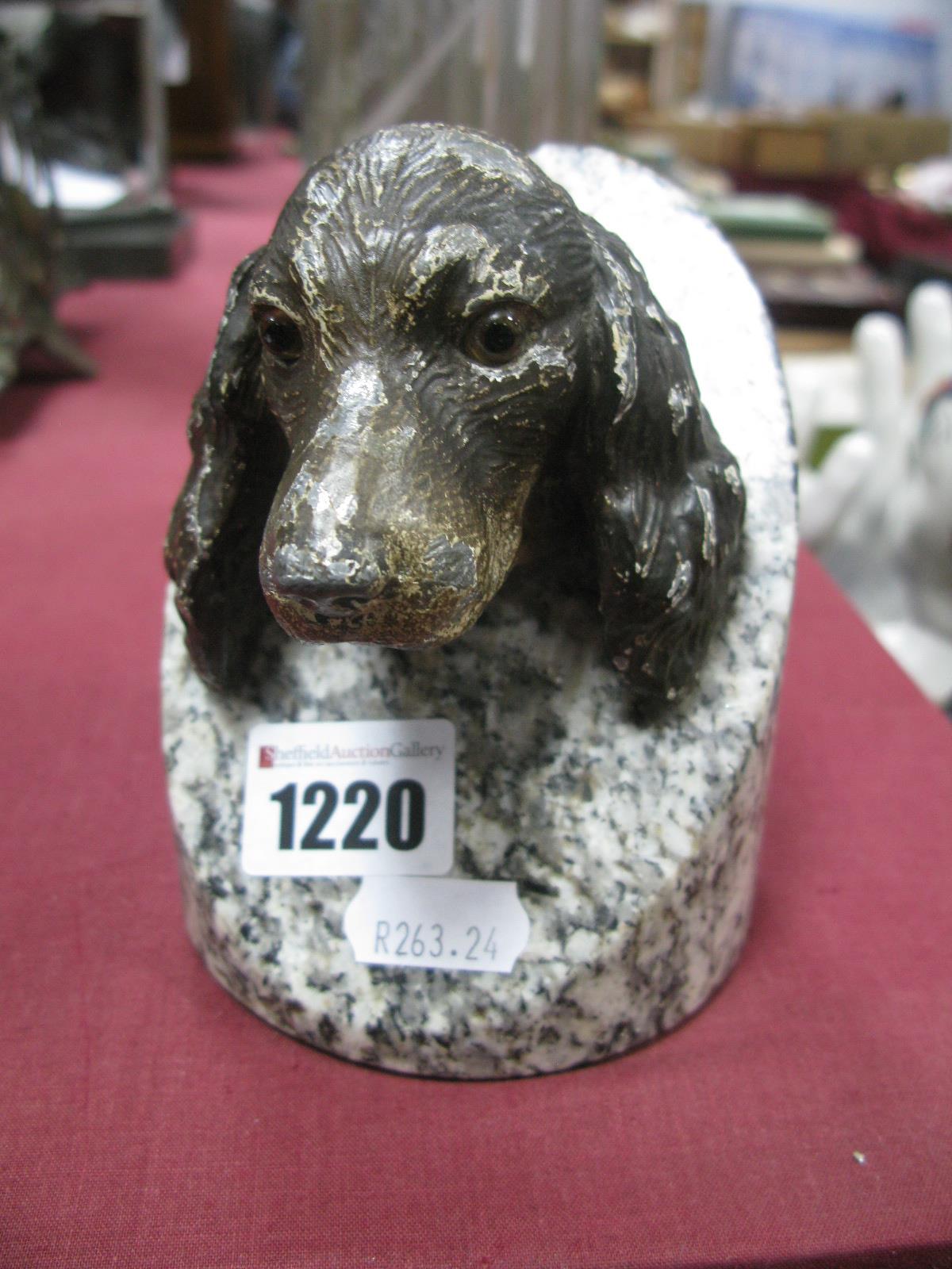 An Art Deco Cold Painted Spelter Bust of a Spaniel, with glass eyes, mounted in marble plinth,