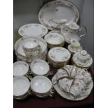 A Royal Albert/Paragon Dinner Service in the Victoriana Rose Pattern, comprising twelve dinner