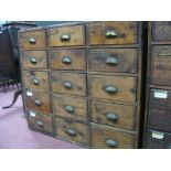 An Early XX Century Pine Chest, of fifteen drawers, with brass cup handles.