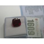 A Cushion Cut Ruby, unmounted; together with a Global Gems Lab Certificate card stating carat weight