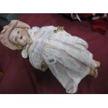 An Early XX Century Bisque Headed Doll by Armand Marseille, head stamped 990/10/1M, fixed eyes, open