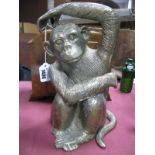 A Modern Brass Hollow Cast Seated Monkey, 30cm