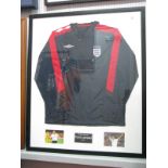 Frank Lampard, pen autograph (unverified) on an Umbro blue England wet top, as a montage with