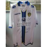 Leeds United Macron Home Shirt Bearing Signatures, including Eddie Gray, Ormesby, Glyn Snodin,