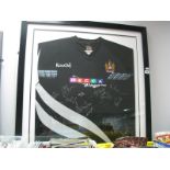 Rugby League, Wigan Warriors thirteen signatures (unverified) on a Kooga black away shirt bearing