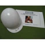 Stirling Moss. Half Scale Classic Helmet Baring Everoak Label and black pen signature. 15.5cm