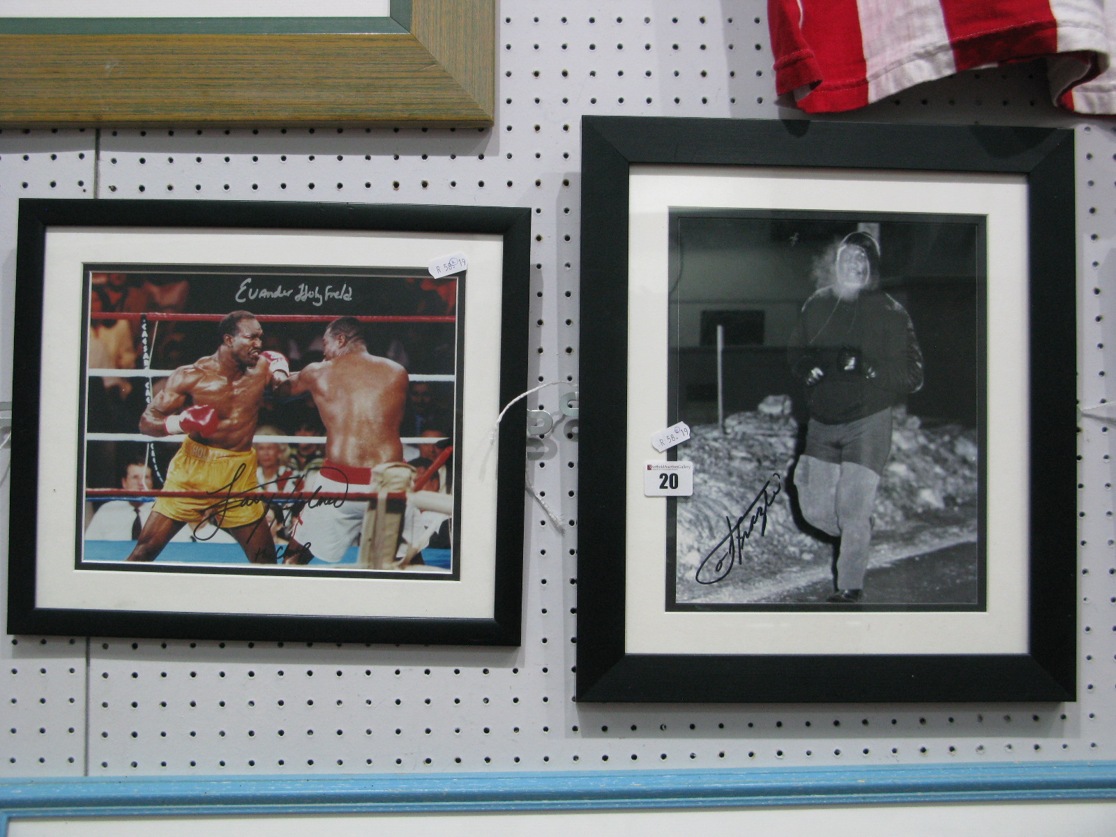 Boxing, Larry Holmes and Evander Holyfield autographs (unverified) on a print of them in a bout 18.5