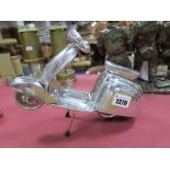A Chrome Effect Cast Metal Model Scooter.