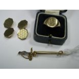 A Pair of 9ct Gold Gent's Cufflinks, of octagonal shape, with one engine turned panel, on chain