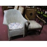 A 1920's Armchair with a Carved Back, upholstered seat, on turned and lock supports, together with a
