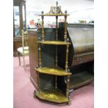 A XIX Century Walnut Four High Corner What-Not, with turned finials, turned supports, 138cm high,