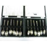 A Matched Set of Twelve Hallmarked Silver Teaspoons, contained in two fitted cases. (2)