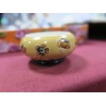 Macintyre Pottery Poppy Pattern Salt Cellar, on mustard ground, No 401753 5.5cm diameter.