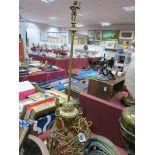 A Brass Continental Four Branch Table Lamp, with cavalier finial, mask and figural shade on circular