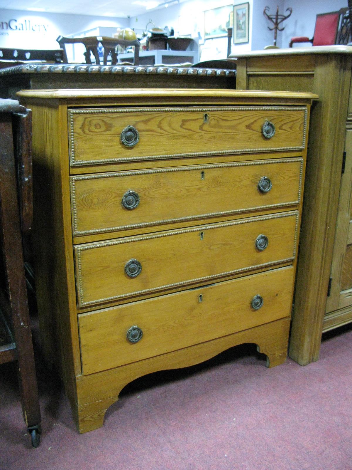 A XX Century Small Pine Chest of Drawers, with four drawers on bracket feet.