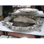 A Highly Decorative XIX Century Plated Salver, of shaped circular form, profusely detailed in