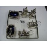 A Hallmarked Silver Six Piece Cruet Set, each with gadrooned edge, together with a matched set of