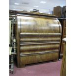 A XIX Century Biedermeier Mahogany Cylinder Bureau, with a fall front, fitted interior, three long