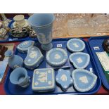 Wedgwood Powder Blue Jasperware, including vases, 19cm and smaller, jars and covers, pin dishes,