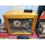 An Electric Day Time Master Clock Machine (cased).