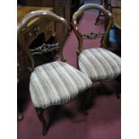 A Set of Six XIX Century Walnut Salon Chairs, with a 'C' scroll centre rail, with upholstered seats,