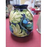 A Moorcroft Pottery Vase, painted in the 'Watchful Eye' pattern from The William Morris
