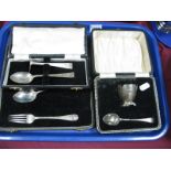 A Hallmarked Silver Egg Cup and Spoon, in a fitted case; two hallmarked silver cutlery sets/one