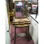 A XIX Century Mahogany Dressing Table Mirror, with a rectangular mirror, shaped supports and base,