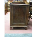 An Edwardian Inlaid Mahogany Purdonium with a low back, fall front panelled door, on tapering