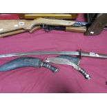An Oriental Curved Sword, blade chipped, handle loose, Tang unmarked, overall length 80cm and two