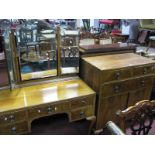 A XX Century Walnut Cabinet, with a low back, two short, one long over cupboard doors, on cabriole