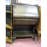 Early XX Century Oak Bureau, with curved fall front, over single drawer and open bookshelf with