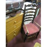 An Early XIX Century Ash/Elm Ladder Back Chair, with turned arms, upholstered seat, on turned