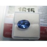 An Oval Cut Tanzanite, unmounted; together with a Global Gems Lab Certificate card stating carat