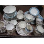 A Late XIX Century Tea Service, tea cups, saucers, sugar bowl, cream jug, together with one other